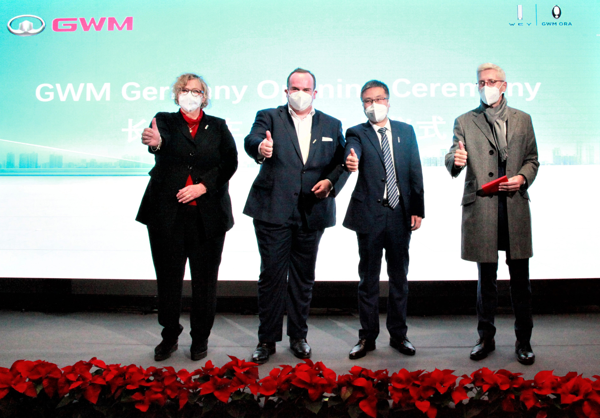 Eröffnung in München: Dr. Ulrike Wolf (Ministerialdirektorin Bayerisches Wirtschaftsministerium), Clemens Baumgärtner (Wirtschaftsreferent München), Xianghua Qiao (CEO GWM Europe), Bernd Riedel (BMW AG) (Foto: GWM)